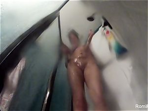sex industry star Romi Rain brings her camera in the bathroom